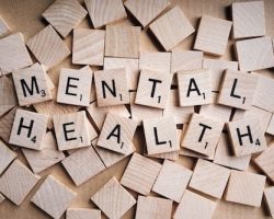 Scrabble Tiles spelling out Mental Health
