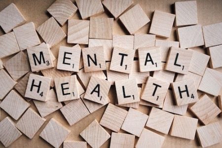 Scrabble Tiles spelling out Mental Health