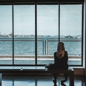 Woman looking out the window